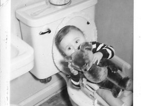 1950 Dave 11 mos w Teddy toilet training.jpg